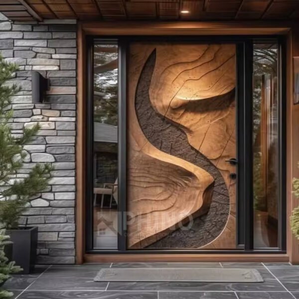 Detail of carved door handle and frame on solid wood entrance door
